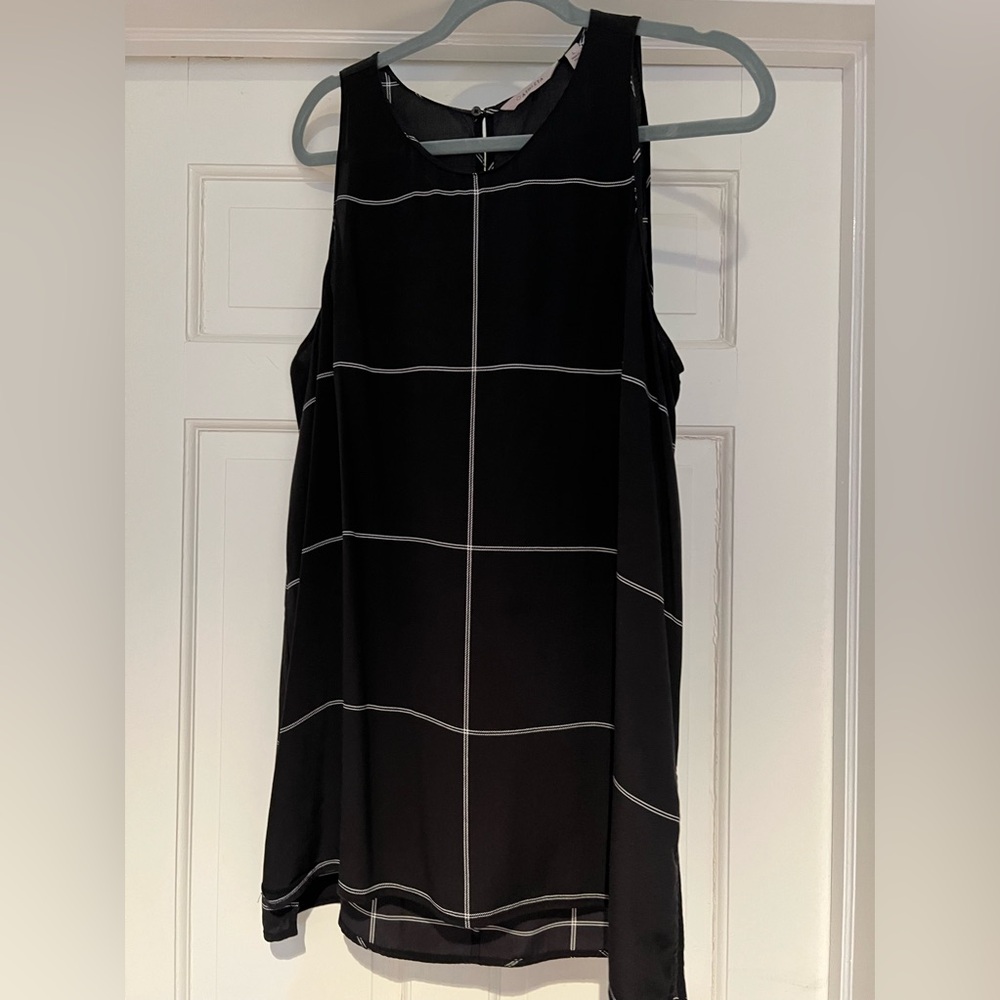 Athleta silk top - longer length, size large black with window pane design